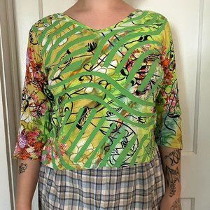 green cyber graphic long sleeve with abstract floral print and textural detail